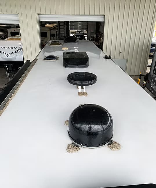 RV roof being serviced